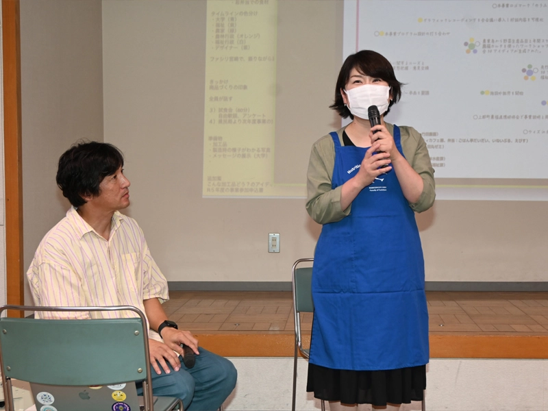 開発の経緯などを発表する田丸准教授。左は「いねいぶる」の宮崎宏興理事長