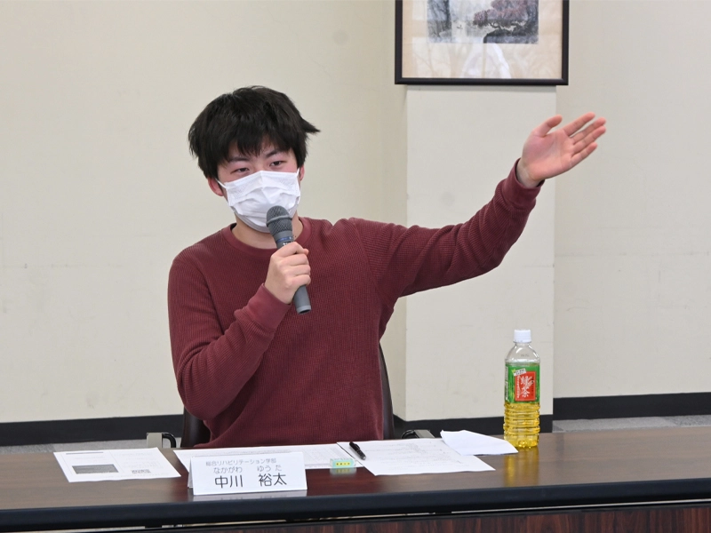 セグウェイの保管場所を知らせる中川さん